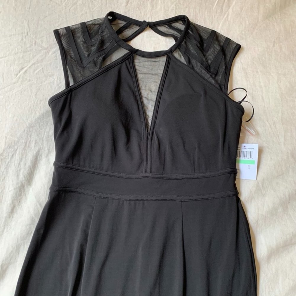 Long black formal dress with mesh, geometric detail